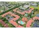 Aerial view of community with pools and multiple residential buildings at 901 Charo Pkwy # 732, Davenport, FL 33897