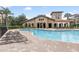 Resort-style pool with plenty of lounge chairs at 901 Charo Pkwy # 732, Davenport, FL 33897