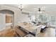 Open concept dining area with view of living room and bathroom at 901 Charo Pkwy # 732, Davenport, FL 33897