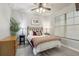 Cozy bedroom with a comfortable bed and ample natural light at 901 Charo Pkwy # 732, Davenport, FL 33897