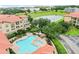 Aerial view of community pool and surrounding buildings at 901 Charo Pkwy # 732, Davenport, FL 33897