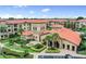 Luxury condo community with resort-style amenities and lush landscaping at 901 Charo Pkwy # 732, Davenport, FL 33897