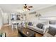 Open concept living and dining area with a kitchen view at 901 Charo Pkwy # 732, Davenport, FL 33897