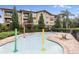 Refreshing splash pad with colorful water features at 901 Charo Pkwy # 732, Davenport, FL 33897