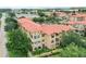 Aerial view of building showcasing Spanish tile roof at 901 Charo Pkwy # 732, Davenport, FL 33897