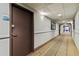 Building hallway with carpeted floor and neutral wall color at 6165 Carrier Dr # 1206, Orlando, FL 32819