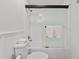 Clean bathroom with shower/tub combo and white fixtures at 6165 Carrier Dr # 1206, Orlando, FL 32819