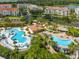 Inviting community pool area with multiple pools, cabanas, lounge chairs, and lush landscaping at 4114 Breakview Dr # 406, Orlando, FL 32819