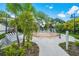 Splash pad with water features, lounge chairs, and lush greenery, ideal for  at 4114 Breakview Dr # 406, Orlando, FL 32819