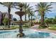 Ornate fountain in the resort courtyard with palm trees at 4114 Breakview Dr # 406, Orlando, FL 32819