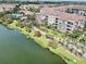 Aerial view of lakefront community with resort-style amenities at 4114 Breakview Dr # 406, Orlando, FL 32819