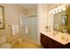 Bathroom with a walk-in shower, vanity, and toilet at 4114 Breakview Dr # 406, Orlando, FL 32819