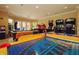 Game room with air hockey, pool table, and arcade games at 4114 Breakview Dr # 406, Orlando, FL 32819