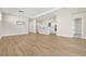 Open concept kitchen with white cabinets and island at 815 Liliana Dr, Deland, FL 32724