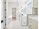 Spa-like bathroom with walk-in shower, double vanity, and private access to the closet at 815 Liliana Dr, Deland, FL 32724