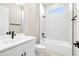 Clean bathroom with a shower/tub combo, vanity, and toilet at 815 Liliana Dr, Deland, FL 32724