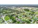 Aerial view of neighborhood with houses and roads at 4256 Fort Courage Cir, Kissimmee, FL 34746