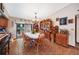 Bright dining room with wood table and hutch at 4256 Fort Courage Cir, Kissimmee, FL 34746