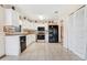 Neat kitchen featuring white cabinets and tile flooring at 5920 Norvale Ct, Orlando, FL 32808