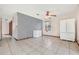 Common area with tiled floor, ceiling fan, and access to backyard at 5920 Norvale Ct, Orlando, FL 32808