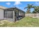 A screened enclosure provides additional outdoor living space at 5920 Norvale Ct, Orlando, FL 32808