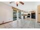 Kitchen features white cabinets, stainless steel appliances, and tiled floor at 5920 Norvale Ct, Orlando, FL 32808