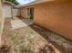 Small patio and fenced backyard with a storage shed at 1811 Winter Green Blvd, Winter Park, FL 32792