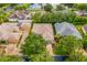 Cluster of homes viewed from above, showing driveways and landscaping at 316 Shelbourne Loop, Kissimmee, FL 34759