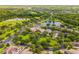 Community overview featuring homes near a golf course and lake at 316 Shelbourne Loop, Kissimmee, FL 34759