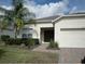 Single-Gathering home with two-car garage and landscaping at 346 Kildrummy Dr, Davenport, FL 33896