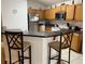 Kitchen with stainless steel appliances and wood cabinets at 346 Kildrummy Dr, Davenport, FL 33896