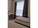 Bright bedroom with large window and built-in shelving at 1073 S Hiawassee Rd # 1018, Orlando, FL 32835