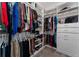 Large walk-in closet with ample hanging and shelf space at 1839 Good Neighbor Loop, Kissimmee, FL 34744