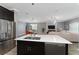 Modern kitchen island with double sink and dishwasher at 1839 Good Neighbor Loop, Kissimmee, FL 34744