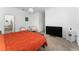 Spacious bedroom with large TV and ensuite bathroom access at 1839 Good Neighbor Loop, Kissimmee, FL 34744