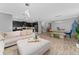Spacious living area showcasing open floor plan and kitchen view at 1839 Good Neighbor Loop, Kissimmee, FL 34744