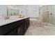 Modern bathroom with double vanity, soaking tub and shower at 1839 Good Neighbor Loop, Kissimmee, FL 34744