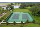 Two well-maintained tennis courts, ready for recreation at 1839 Good Neighbor Loop, Kissimmee, FL 34744