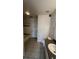 Clean bathroom with a bathtub, toilet, and vanity at 6413 Astor Village Ave # 303, Orlando, FL 32835