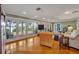 Relaxing living room with hardwood floors and sliding glass doors at 279 Rippling Ln, Winter Park, FL 32789