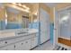 Retro bathroom with light blue tile and built-in storage at 279 Rippling Ln, Winter Park, FL 32789