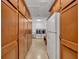 Laundry room with ample cabinetry and washer/dryer at 279 Rippling Ln, Winter Park, FL 32789