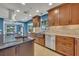 Modern kitchen with stainless steel appliances and granite countertops at 279 Rippling Ln, Winter Park, FL 32789