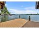 Lakefront property with a spacious wooden dock at 279 Rippling Ln, Winter Park, FL 32789