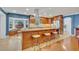 Modern kitchen with stainless steel appliances and custom wood cabinetry at 279 Rippling Ln, Winter Park, FL 32789