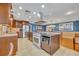 Updated kitchen with stainless steel appliances and custom cabinetry at 279 Rippling Ln, Winter Park, FL 32789