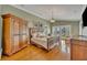 Spacious main bedroom with hardwood floors and private access at 279 Rippling Ln, Winter Park, FL 32789