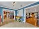 Bright office area with view into kitchen and living room at 279 Rippling Ln, Winter Park, FL 32789