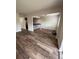 Living room with new wood-look flooring at 1000 Lake Of The Woods Blvd # C205, Fern Park, FL 32730