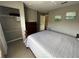 Bedroom with closet and dresser, carpeted floor at 4000 Santa Maria Dr # 105, Kissimmee, FL 34741